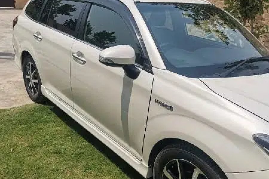 ٹویوٹا ایکسیو فیلڈر ہائبرڈ ڈبلیو ایکس بی ماڈل 2018 امپورٹ 2022 غیر رجسٹرڈ کینال ٹاؤن، پشاور