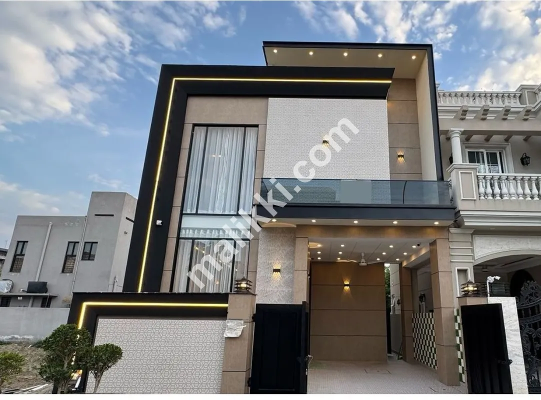 A Fully Furnished 5 Marla Designer Built Brand New House for sale in very Negotiated Price in DHA Phase 9 Town