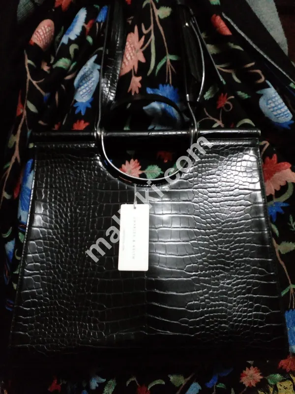 چارلس اور کیتھ کا کندھے کا بیگ