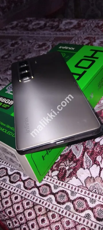 Infinix hot50 pro plus condition 10/10 with complete box mobile warranty ma hai serious buyer contact me