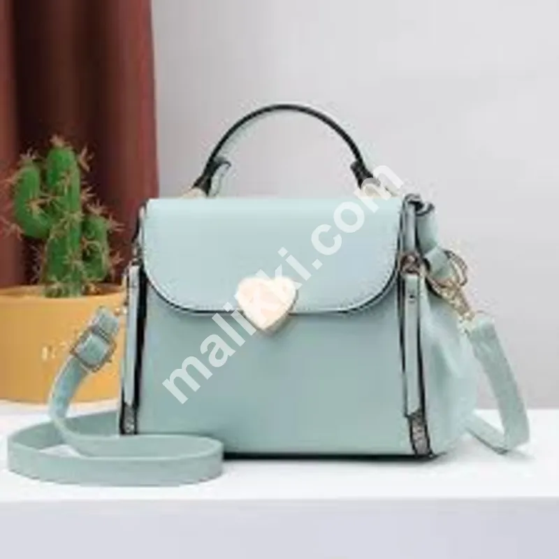 ہلکا سبز ہینڈ بیگ